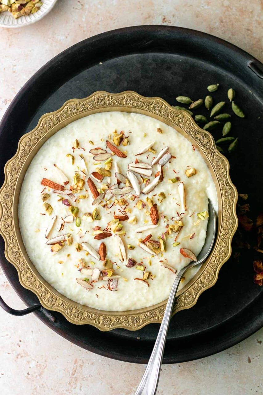 Kheer is a classic Pakistani dessert similar to a rice pudding. It's made with milk, sugar, and rice cooked together with spices like cardamom, cinnamon, and nutmeg. Kheer can be flavored with various ingredients like saffron, rose water, or nuts, and is often served chilled. Kheer is a classic Pakistani dessert similar to a rice pudding. It's made with milk, sugar, and rice cooked together with spices like cardamom, cinnamon, and nutmeg. Kheer can be flavored with various ingredients like saffron, rose water, or nuts, and is often served chilled.