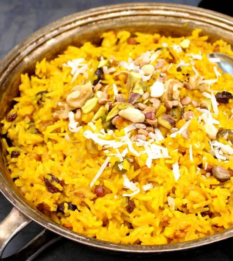 Zarda is a traditional Pakistani dessert made with sweet, fragrant rice cooked in milk, sugar, and spices like cardamom, saffron, and cinnamon. It's often flavored with rose water or kewra (screw pine essence) and garnished with nuts like almonds or pistachios. Zarda is a traditional Pakistani dessert made with sweet, fragrant rice cooked in milk, sugar, and spices like cardamom, saffron, and cinnamon. It's often flavored with rose water or kewra (screw pine essence) and garnished with nuts like almonds or pistachios.